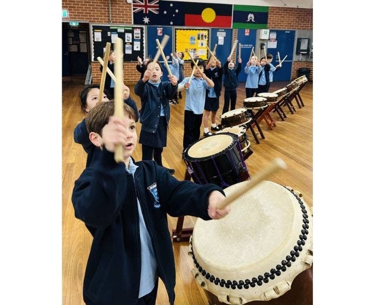 students playing drums