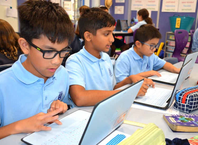 student learning on digital devices