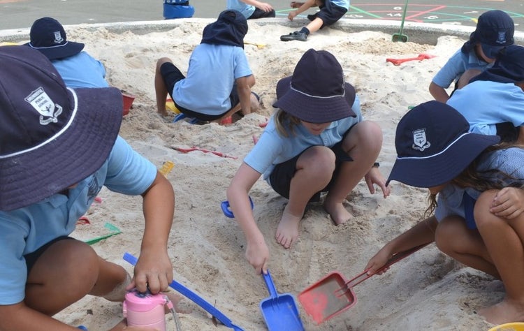 students playing in sandpit at drummoyne public school